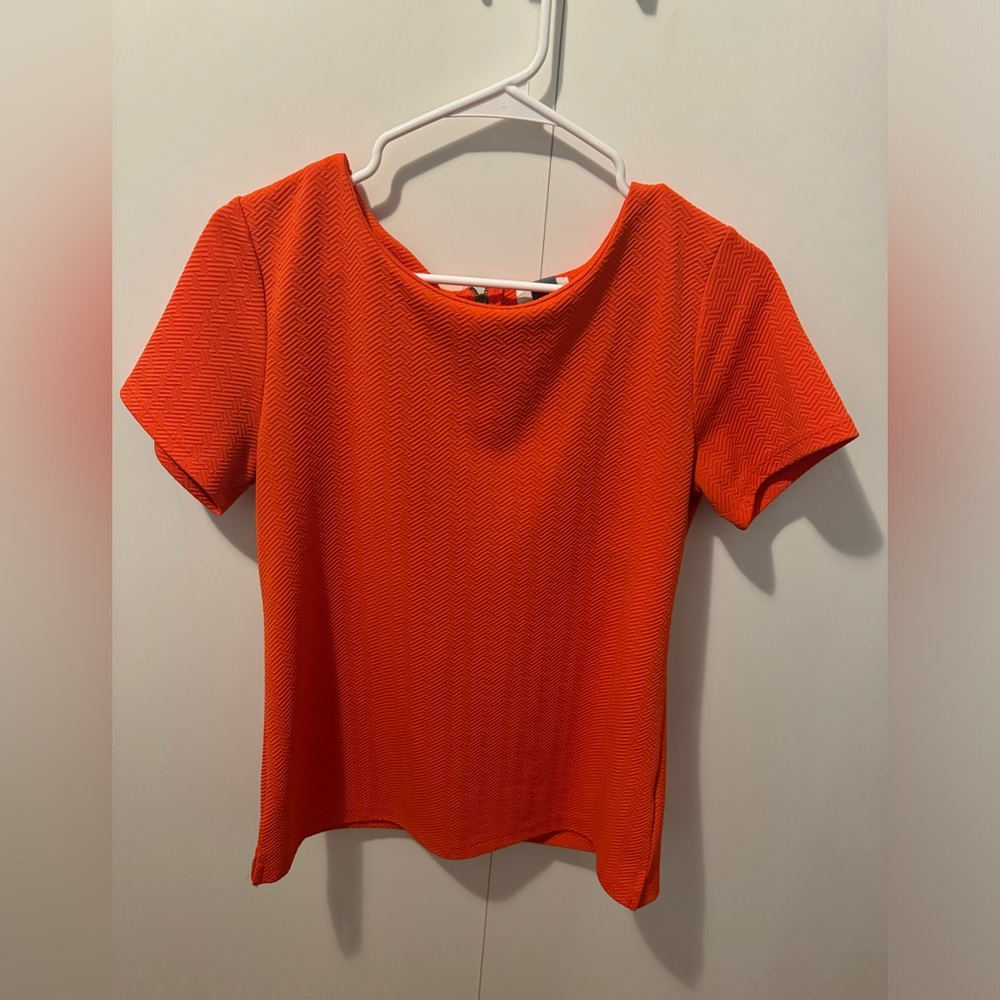 Textured orange short-sleeve top with back zipper